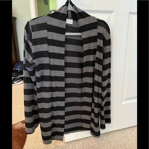 Womens cardigan says size Large but fits like a medium black and gray stripes
